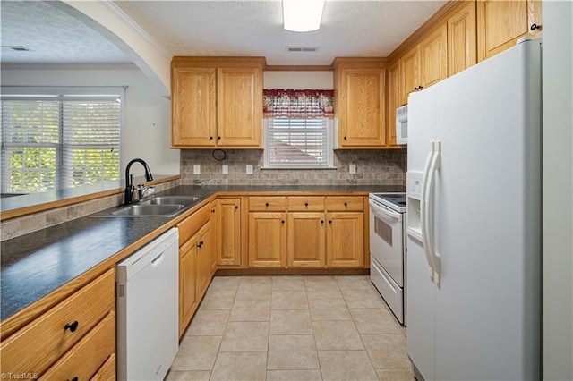 149 Royal View Dr Unit 1, Pinnacle, NC 27043 - kitchen featuring white appliances, a sink, dark countertops, decorative backsplash, and a textured ceiling