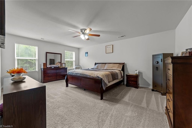 203 Cross Country Chase, Stokesdale, NC 27357 - bedroom featuring a ceiling fan, light colored carpet, and visible vents