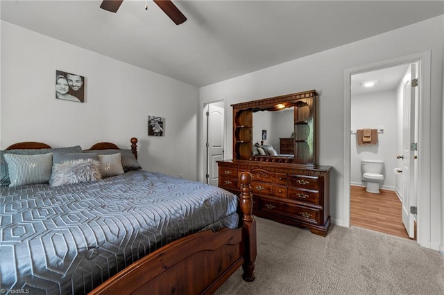 203 Cross Country Chase, Stokesdale, NC 27357 - carpeted bedroom with connected bathroom and a ceiling fan