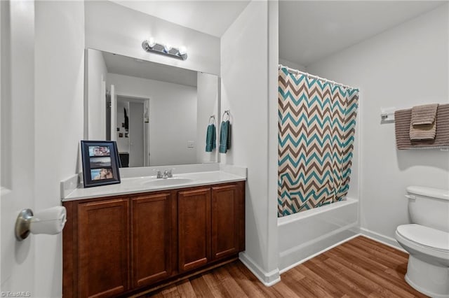 203 Cross Country Chase, Stokesdale, NC 27357 - full bath featuring vanity, toilet, baseboards, wood finished floors, and shower / tub combo