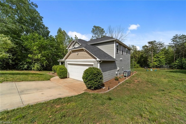 203 Cross Country Chase, Stokesdale, NC 27357 - view of side of home featuring a lawn, central air condition unit, driveway, and a garage