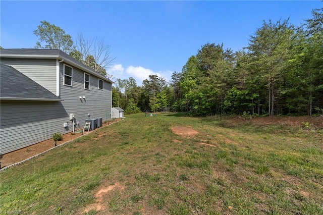 203 Cross Country Chase, Stokesdale, NC 27357 - view of yard featuring central AC
