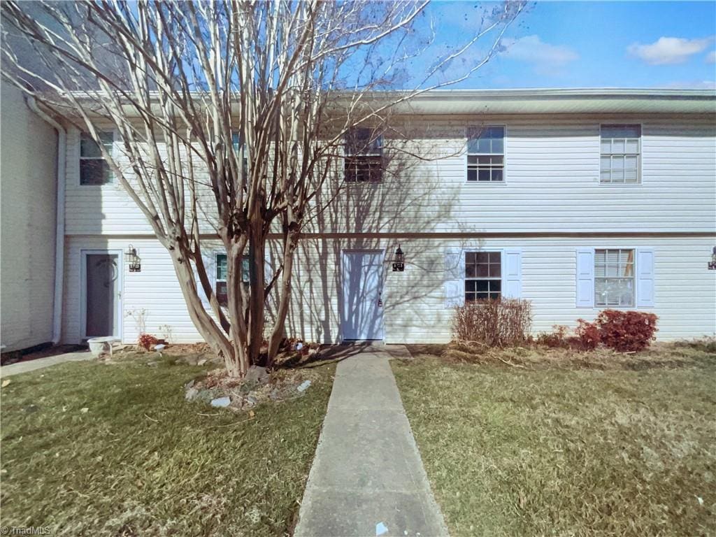 exterior space with a front yard