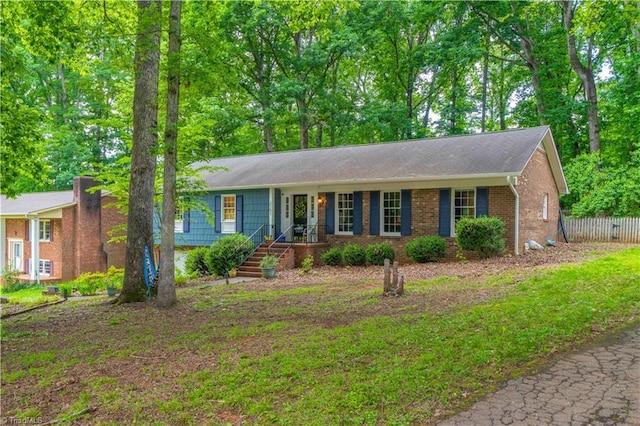 2151 Foxhunter Ct, Winston-Salem, NC 27106 - ranch-style house featuring brick siding