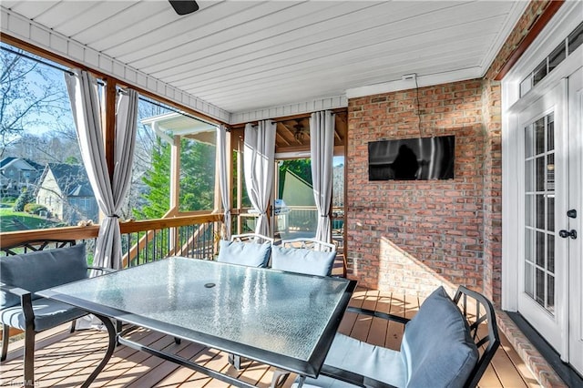 sunroom / solarium featuring plenty of natural light