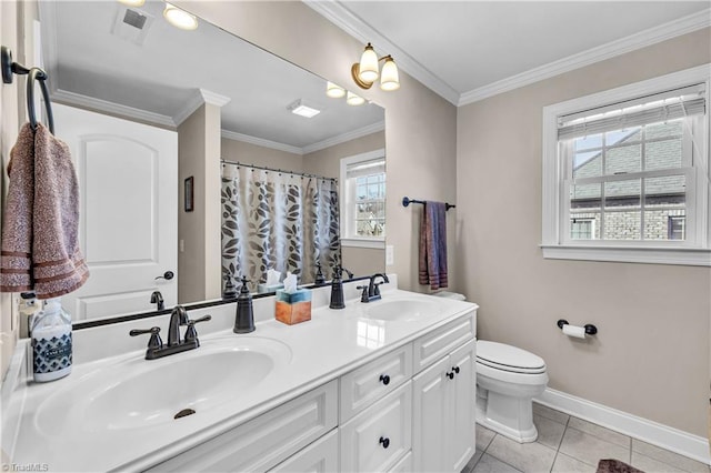 bathroom with tile patterned flooring, vanity, a healthy amount of sunlight, and ornamental molding