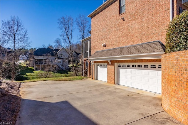 view of side of property featuring a garage