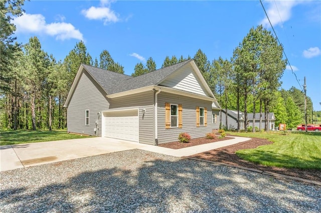 view of home's exterior featuring a lawn, a garage, roof with shingles, and concrete driveway