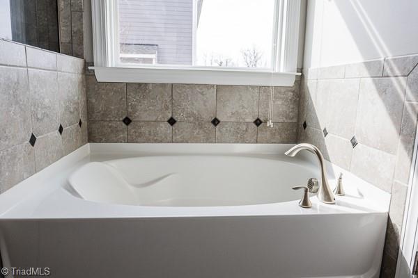 bathroom featuring a bathing tub