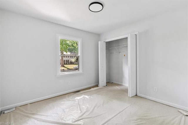 1710 Scarborough Rd, High Point, NC 27265 - unfurnished bedroom with a closet and baseboards
