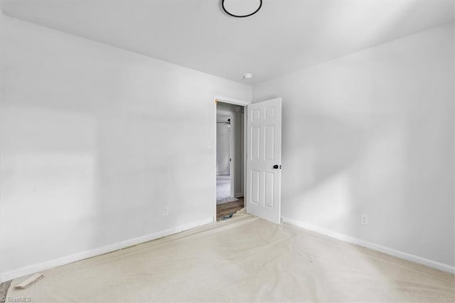 1710 Scarborough Rd, High Point, NC 27265 - carpeted empty room with baseboards