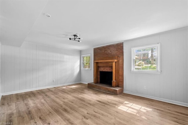 1710 Scarborough Rd, High Point, NC 27265 - unfurnished living room with wood finished floors and a fireplace