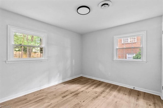 1710 Scarborough Rd, High Point, NC 27265 - unfurnished room featuring plenty of natural light and light wood-style floors