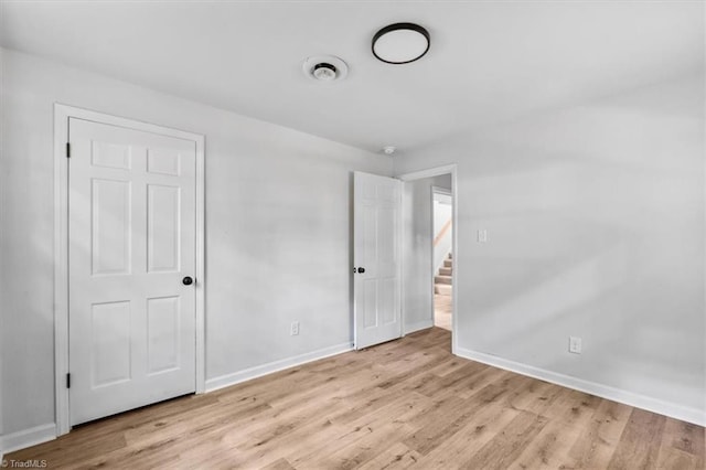 1710 Scarborough Rd, High Point, NC 27265 - unfurnished bedroom with light wood-type flooring