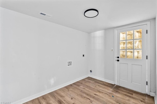 1710 Scarborough Rd, High Point, NC 27265 - washroom with hookup for an electric dryer, hookup for a washing machine, and wood finished floors