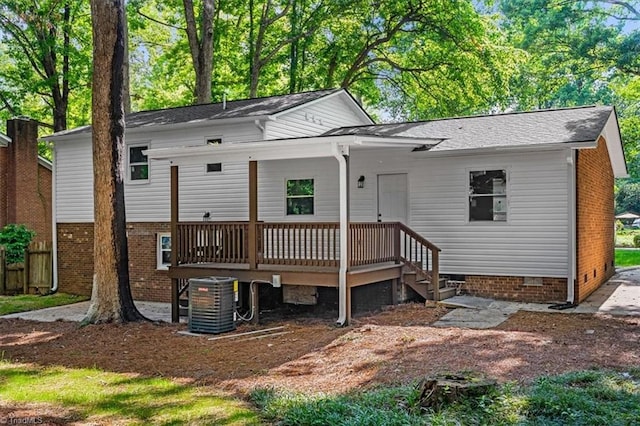 1710 Scarborough Rd, High Point, NC 27265 - back of property featuring brick siding, crawl space, and a deck