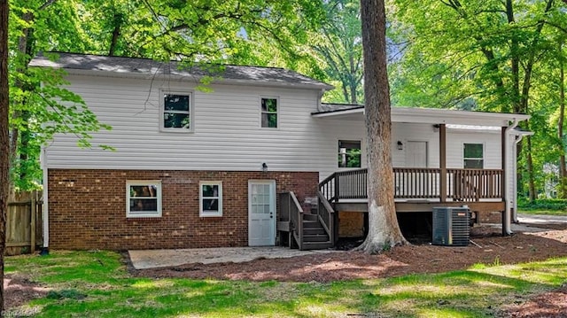 1710 Scarborough Rd, High Point, NC 27265 - back of house featuring stairway, a deck, and brick siding
