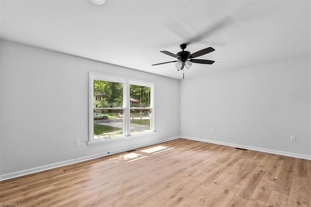 1710 Scarborough Rd, High Point, NC 27265 - unfurnished room with light wood-style floors and a ceiling fan