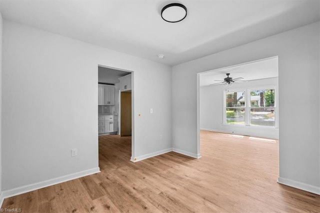 1710 Scarborough Rd, High Point, NC 27265 - spare room featuring light wood-style flooring and ceiling fan
