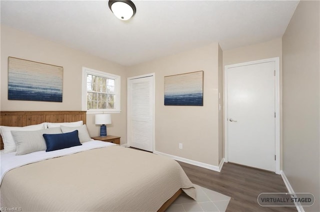 bedroom featuring dark hardwood / wood-style flooring