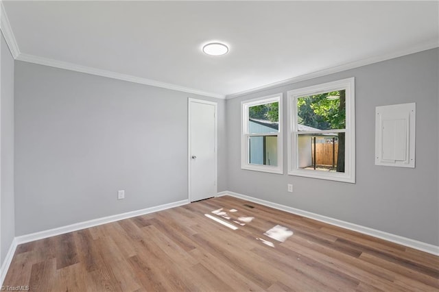 5403 Southmont Dr, Julian, NC 27283 - empty room with ornamental molding and wood finished floors
