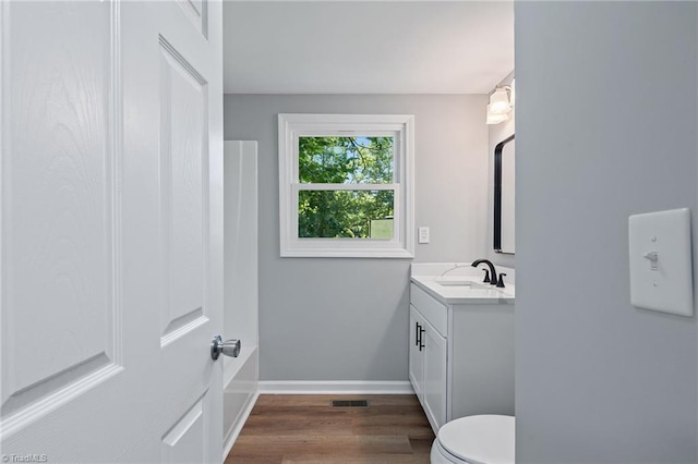 5403 Southmont Dr, Julian, NC 27283 - bathroom featuring vanity and wood finished floors