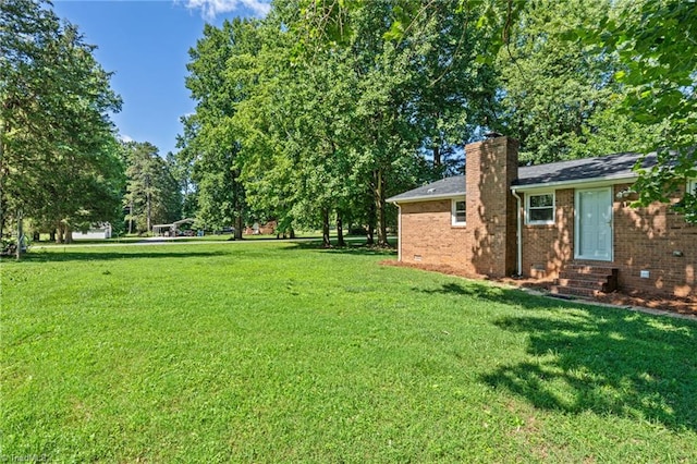 5403 Southmont Dr, Julian, NC 27283 - view of green lawn featuring entry steps