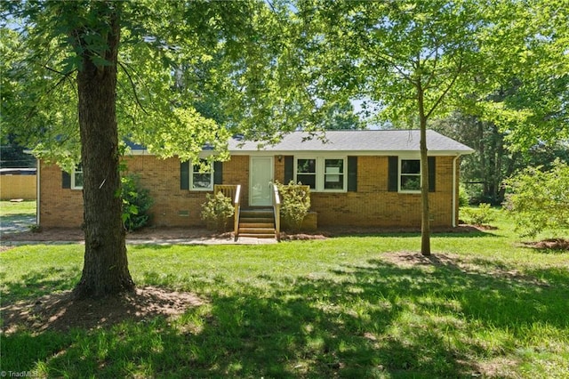 5403 Southmont Dr, Julian, NC 27283 - ranch-style home with brick siding and a front yard