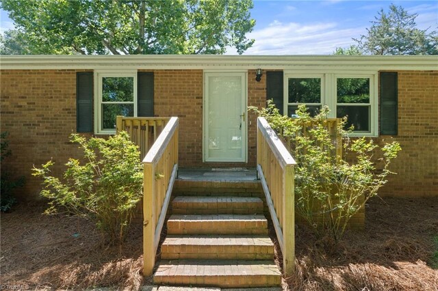 5403 Southmont Dr, Julian, NC 27283 - entrance to property featuring brick siding