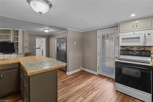 kitchen with light wood-type flooring, range with electric stovetop, washer / clothes dryer, stainless steel refrigerator with ice dispenser, and white microwave