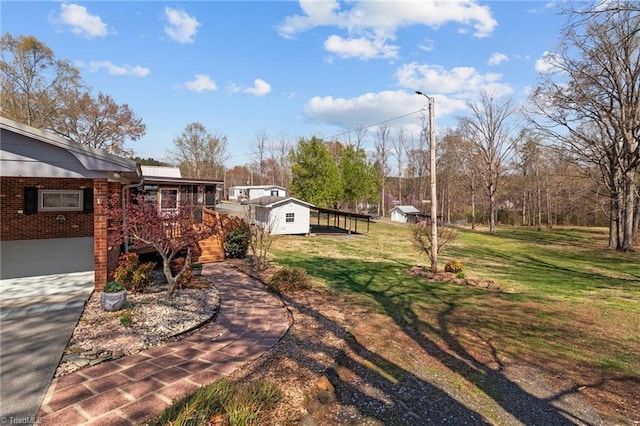 view of yard featuring a deck
