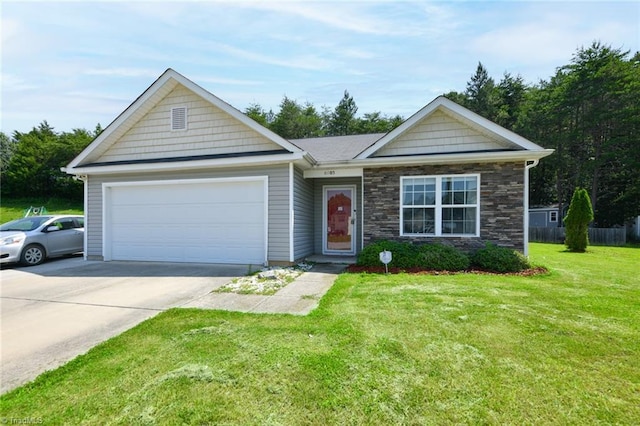 6605 Stickley Ct, Whitsett, NC 27377 - ranch-style home featuring driveway, a garage, a front lawn, and stone siding