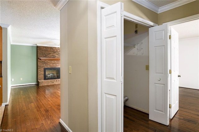 211 Chadbourne Dr, Winston-Salem, NC 27104 - hall featuring hardwood / wood-style floors, crown molding, and a textured ceiling