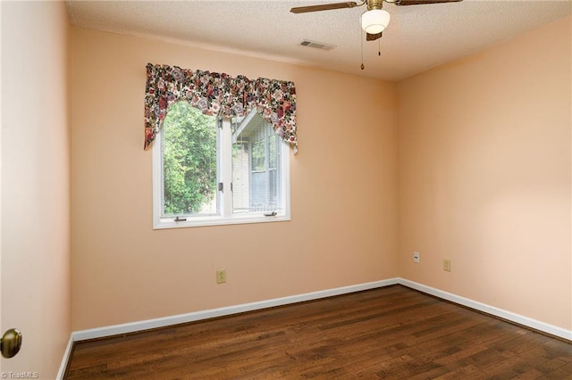 211 Chadbourne Dr, Winston-Salem, NC 27104 - unfurnished room featuring dark wood-style floors, a ceiling fan, and a textured ceiling