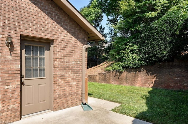 211 Chadbourne Dr, Winston-Salem, NC 27104 - doorway to property featuring brick siding