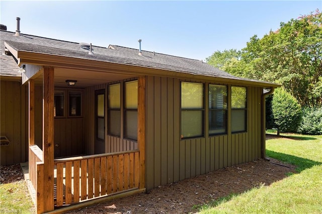 211 Chadbourne Dr, Winston-Salem, NC 27104 - view of property exterior featuring roof with shingles