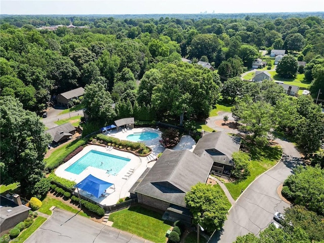 211 Chadbourne Dr, Winston-Salem, NC 27104 - aerial view of a pool and a heavily wooded area