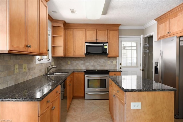 211 Chadbourne Dr, Winston-Salem, NC 27104 - kitchen featuring appliances with stainless steel finishes, open shelves, a kitchen island, backsplash, and ornamental molding