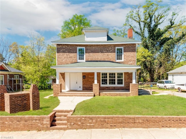 view of front of home featuring a porch and a front yard