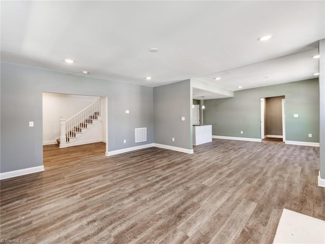 unfurnished room featuring wood-type flooring