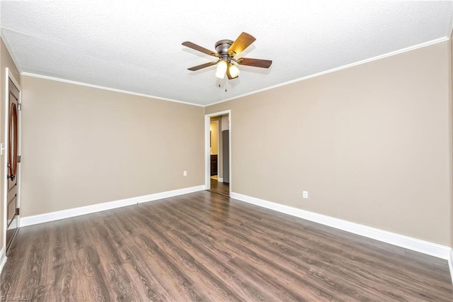 225 E Greencrest Dr, Millers Creek, NC 28651 - spare room with dark wood-style floors, a ceiling fan, baseboards, crown molding, and a textured ceiling