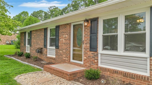 225 E Greencrest Dr, Millers Creek, NC 28651 - doorway to property featuring brick siding