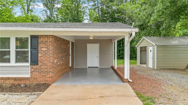 225 E Greencrest Dr, Millers Creek, NC 28651 - doorway to property with brick siding, a carport, and roof with shingles