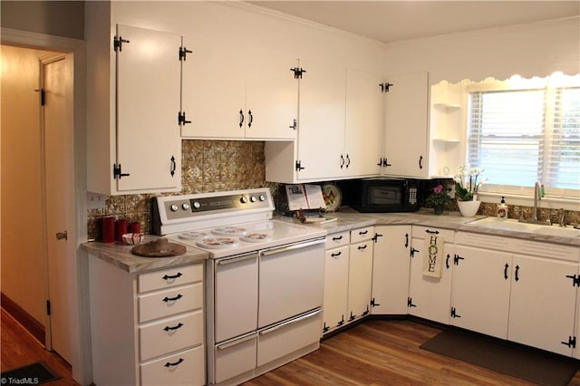 kitchen with dark hardwood / wood-style flooring, white range, white cabinetry, and sink