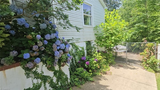 942 Holland St, Winston-Salem, NC 27101 - view of property exterior with a gate