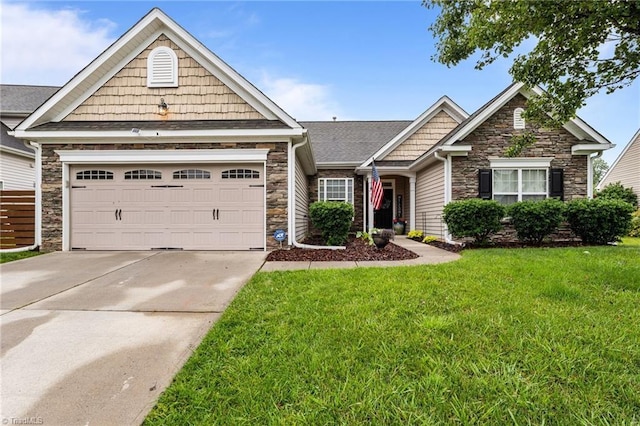 183 Kentland Ridge Dr, Kernersville, NC 27284 - craftsman inspired home featuring stone siding, a front lawn, concrete driveway, and a garage