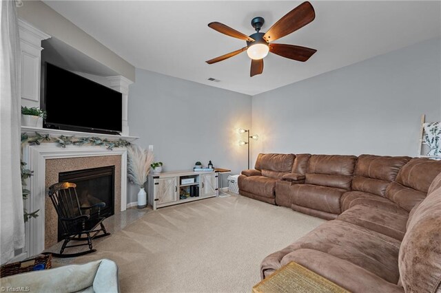 183 Kentland Ridge Dr, Kernersville, NC 27284 - living room featuring a ceiling fan and a glass covered fireplace