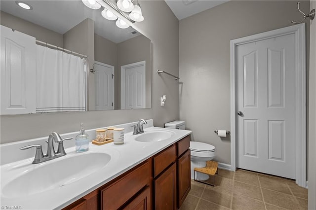 183 Kentland Ridge Dr, Kernersville, NC 27284 - full bath featuring double vanity, toilet, tile patterned flooring, and curtained shower