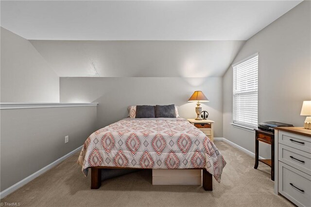 183 Kentland Ridge Dr, Kernersville, NC 27284 - bedroom featuring lofted ceiling, light carpet, and baseboards