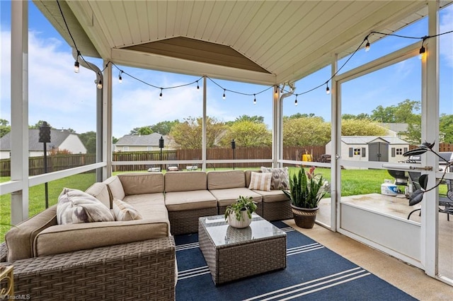 183 Kentland Ridge Dr, Kernersville, NC 27284 - sunroom with lofted ceiling, healthy amount of natural light, an outdoor hangout area, and a residential view